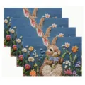 Set of embroidered placemats featuring a cute rabbit and wildflower design on blue fabric. - 30x45cm / Style 2