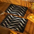 Black and gold leaf print placemat, stylish heat-resistant fabric table mat for dining. - Black Gold Leaves
