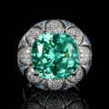 Exquisite vintage cushion-cut green gemstone ring detail with brilliant pavé zircon halo. - Paraiba Green Ring