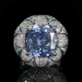 Vintage cushion-cut blue gem statement ring with detailed pavé stones floral cluster detail - Sapphire Blue Ring