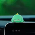 Cute green dinosaur car dashboard figurine, adorable resin ornament for auto interior decor. - Lying Dinosaur Plush Toy