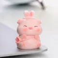 Cute pink pig resin figurine with rabbit ears and flower for car dashboard and home decor. - Pig with Rabbit Ears