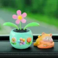 Solar shaking flower car ornament with cute sleeping cat figurine, green dashboard decor. - Three Flowers + Shiba Inu 3-Piece Set / Mint Green