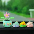 Cute cartoon car dashboard ornament set with solar shaking flower and sleeping animals. - Three Small Flowers + Dinosaur + Duck + Pig 5-Piece Set / Mint Green