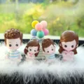 Cute cartoon family car dashboard ornament with colorful balloons and soft feather decor. - Yoga Family of Four & Balloon with Large Feather