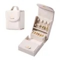 Portable white leather jewelry box with multi-layer storage, ring and necklace slots. - White