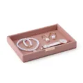 Pink leather jewelry storage tray with pearl necklace and watch display for desktop organizing. - Storage Tray / Pink
