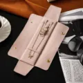 Pink velvet travel jewelry roll organizer, portable storage bag for necklaces and rings. - Pink