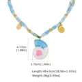 Collier ruban en tissu bohème avec pendentif coquillage, design floral bleu pour femmes. - Style 2 (NC-3212G)