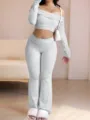 Conjunto de dos piezas elegante con top corto de manga larga y pantalon acampanado. - S / Top y Pantalones / Gris claro