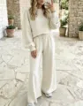 Beige polka dot two-piece lounge set featuring a cropped sweatshirt and wide-leg pants. - S / Top And Bottom / Milky White