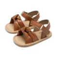 Cute brown baby sandals with knotted bow design, soft leather infant walking shoes for toddlers. - 11cm (0-6 Months) / Brown
