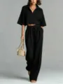 Conjunto de punto negro de dos piezas con top corto tipo polo y pantalón ancho. - S / Top y Pantalones / Negro