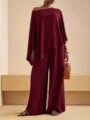 Conjunto burdeos elegante con top asimétrico sin hombros y pantalones anchos para mujer. - S / Top y Pantalones / Burdeos