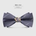 Elegant dark grey men's bow tie featuring a gold leaf metal centerpiece for wedding suits. - Bow Tie - 2164