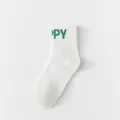 Men's white mid-calf cotton socks with green letter knit design, casual sports variant. - One Size / HAPPY Letters