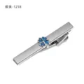Pince à cravate en métal argenté avec trèfle à quatre feuilles bleu, accessoire professionnel chic. - Trèfle à Quatre Feuilles Bleu