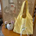 Yellow nylon shoulder bag detail, sweet style floral embroidery and white lace bow design. - Fresh Yellow Lace Bowknot Flower Vest Bag