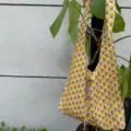 Floral printed canvas knot shoulder bag, stylish casual large capacity daily tote handbag. - Yellow Floral Shoulder Crossbody Tote Bag