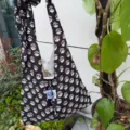 Black floral hobo shoulder bag with knotted strap, casual style for spring and summer daily wear. - Black Folding Fan Floral Shoulder Crossbody Tote Bag