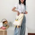 Canvas shoulder bag with cute cartoon duck face embroidery, casual crossbody tote bag for women. - Cute Little Yellow Duck Blue Strap Crossbody Bag