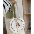 Damen runde Segeltuch Tragetasche mit Buchstaben und Croissant Muster, Freizeittasche. - Runde Croissant Englisch Beige Schultertasche