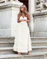 Detail shot of elegant white mesh tiered maxi skirt, summer fashion street style outfit. - S / White