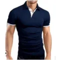 Polo de hombre ajustado de manga corta en azul marino con cuello y puños en contraste. - Azul Marino y Blanco