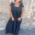 Black sleeveless long dress with floral shoulder straps, elegant summer fashion apparel detail. - S / Black