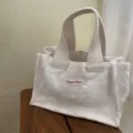 Mini white canvas tote bag with floral embroidery, portable cute handbag for daily use. - Double Layer Lace Style