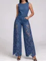 Detailed view of women sleeveless denim wide leg jumpsuit with stunning side lace cutouts. - S / Dark Blue