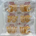 Close-up detail of geometric gold-plated cubic zirconia hoop earrings wholesale packaged. - Geometric Open Style (ZSJEH737)