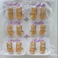 Detail shot of wholesale copper gold-plated cubic zirconia geometric rectangle stud earrings. - Rectangular Style (ZSJEH729)