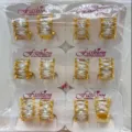 Wholesale gold plated marquise cubic zirconia hoop earrings set on display cards for chic style. - Marquise Style (ZSJEH724)
