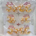 Wholesale gold plated cubic zirconia floral hoop earrings set for women and girls daily wear - Geometric Flower Shape Style (ZSJEH709)