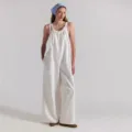 White loose casual jumpsuit detail, comfortable suspender wide leg pant view for women styling. - S / White