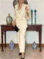 Beige pantsuit with sequin lapel, long sleeve blazer and trousers for women detail view. - S / Top And Bottom / Apricot