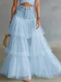 Detail shot of women's high waist denim and tulle spliced tiered maxi skirt, elegant multi layer design. - S / Blue