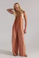 Casual loose denim overall jumpsuit with wide straps and comfortable fit in terracotta color. - Orange Red
