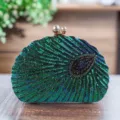 Detailed close-up shot of exquisite peacock pattern sequin evening clutch with pearl clasp. - 23*5*15cm / Navy Blue Pearl Double Buckle
