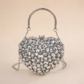 Elegant crystal heart evening clutch bag with metallic handle and chain strap for women. - S / Silver