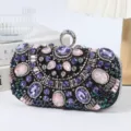 Exquisite rhinestone evening clutch bag with sparkling purple crystals and beaded design. - Black