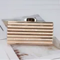 Gold striped acrylic evening clutch bag, stylish hard-shell women's shoulder handbag. - Champagne