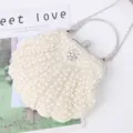 Pearl shell evening bag with metallic handle and chain, elegant wedding party clutch for women. - Beige