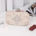 Elegant beaded evening clutch bag with stunning crystal rhinestones and floral clasp design for women. - Gold