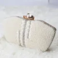 Elegant pearl evening clutch bag for women, stylish banquet handbag with rhinestone decor. - Pearl Clutch / 22x11x4.5cm