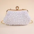 Exquisite detail view of the handmade pearl evening clutch with luxury gold clasp and chain. - 22.5*4*13 / White