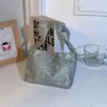 Silver rhinestone evening bag with knotted handle, sparkling crystal design for women. - Silver