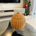 Handmade rattan storage basket with lid and tripod legs, ideal for desktop organization and decor. - WB01 Lidded Jar with Tripod Stand
