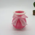 Panier de rangement en plastique tissé rose avec nœud, organisateur de bureau pour petits objets. - Diamètre d'ouverture 8xhauteur 10 cm / Rose